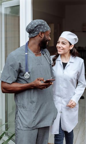 Medical team stands together, showcasing unity and professionalism in healthcare environment.